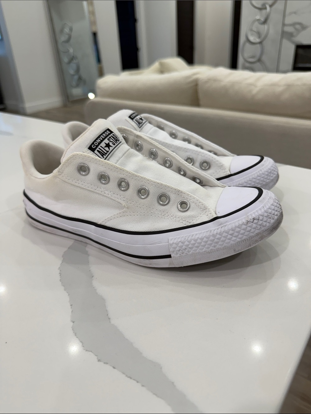 Converse White Low-Top Slip-On Canvas Sneakers with Black Trim - Picture 3 of 10